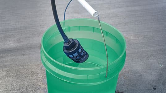 Turbo Jet® HydroX5® connecting to a bucket for water